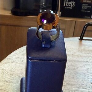 Gold Ring with Purple Gemstone